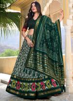 Tussar Silk Green Navratri Wear Ikkat Print Lehenga Choli